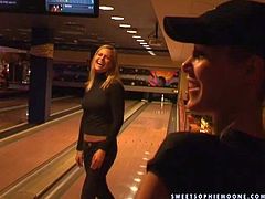Gorgeous and sexy blonde lesbian babes Wivien and her friend enjoy in teasing the boys with their hot bodies as they play with balls in the bowling room and have fun