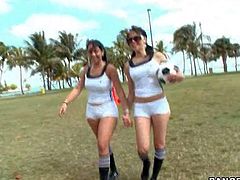 Sophia and Summer Bailey are tow curvy brunettes in sexy white uniform. They play football and then pull down their hotpants to show their perfect big butts in the field. Watch big ass honeys strip in the open air.