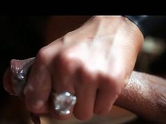 Hot tempered brunette hussy gives a rapacious handjob to long stiff dick of her boyfriend until he jizzes right on her hand in steamy sex clip by Fame Digital.