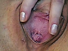 Horny blonde strips and finger fucks her pussy upclose to her cam
