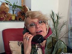 Making a prank call, this granny made her son's pal came to her place. In no time she's down sucking the guy's already hard cock. Making it more stiff with her mouth then have it balls deep in her muff.