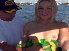 Turned on young amateur blonde slut with natural boobies and great hunger for cock gets down on knees and gives lusty blowjob to stud with six pack on the boat