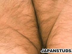 See the horny Japanese hunk Shinichi Sugiyama masturbating while reading a porn magazine in this intense vid.