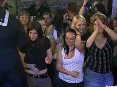 This club is full of lustful bitches who are hungry for cock as hell. So they all go crazy when they see a handsome dude on a stage performing hot striptease show.