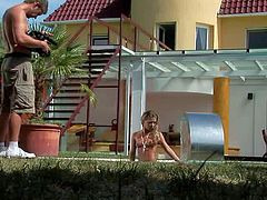 Slender pretty blonde hottie with natural boobs and long legs gets her shaved minge fucked balls deep by her neighbor in close up by the pool on a sunny day