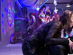 In the middle of wild party, two curvy brunette milfs get on the scene where they start hand stroking each other in front of other sluts in steamy group sex video by Tainster.