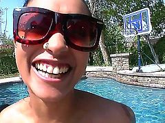 Black haired slut Skin Diamond with sexy tattoos and sexy nose piercing in bikini has fun with her boyfriend in the pool and takes on his stiff pecker with great lust.