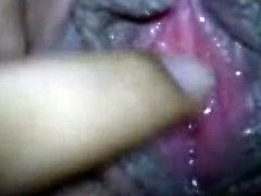 Not pretty pale and just ugly brunette from India lies all naked on the bed. Spoiled harlot plays with her natural tits, stretches vulvar lips and gonna reach orgasm on her own.