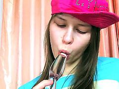 Turned on slutty teen Beata with natural boobies and long legs in skirt stuffs her fish lips and tight firm ass with glass toy while her partner films everything in pov.