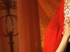 Gorgeous Indian babe poses on cam wearing traditional cloth