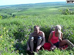 Russian blonde cutie and her boyfriend having picnic in the wild. The fucks doggystyle amongst the long green grass and walk around the beautiful scenery.