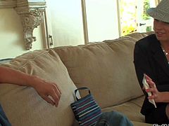 Chris Johnson enjoys in seducing a hot and arousing blonde milf Amanda Blow and getting his hands all over her in their hardcore sex session on the couch in living room