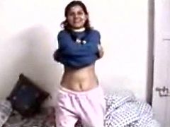 Gorgeous Indian cutie with pretty face and mad curves takes off her top exposing her massive boobs. She takes off her undies and shows her hairy pussy.
