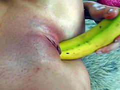 Banana is a lovely brunette in pink boots. Small titty slut parts her legs and inserts thick banana in her fuck hole. She has a great time fucking her hairless snatch with fruits.