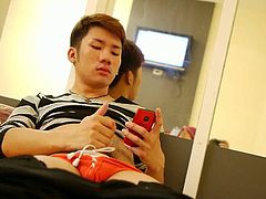 See the horny Thai twink Oil as he strips and plays with his big hard cock in this hot solo video. He definitely knows how to have a hell of a time by himself.