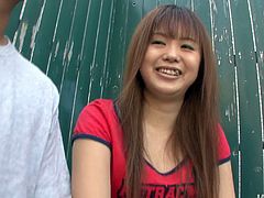 Fresh faced Japanese amateur hooks up with a horny dude in the street. They kiss in lips with passion before she unzips his fly to reach a sturdy penis for a blowjob.