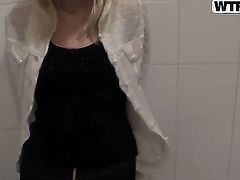 Sexy bllonde gets fucked hard in her wet tight pussy by her boyfriend in a public toilet.