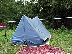 Two rapacious amateur lesbians make out outdoors. They rub their cunts over each other in scissors position before they starts poking them with dildo.
