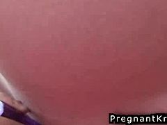 Playful horny chick plays the pussy of her pregnant friend. She moans loud and can't get enough of this vibrator on her clit!