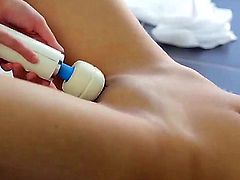 Pretty innocent looking brunette teen Fantina and her slender girlfriend Betty with nice natural boobs pleasure each other with Hitachi vibrator in arousing bedroom action filmed in close up.