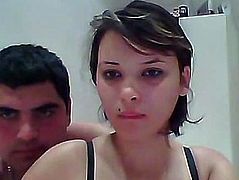 Couple sitting in front of webcam