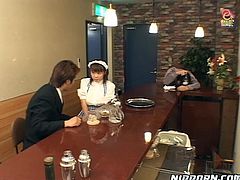 Two sex greedy dudes pick up a curvy Japanese waitress in restaurant. They unbutton her shirt in order to maul oversized milky tits before she bends over a bar counter to get banged from behind.
