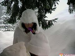 This video is taken outdoor in winter. Adventurous babes strip in freaking cold weather. Watch them pleasing one another with smooth dildo fucking outdoor.