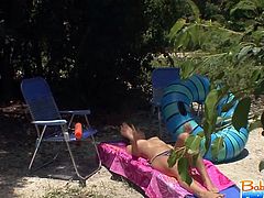 Sophia Sutra does some laundry and then she goes in the backyard to sunbathe. Her boss catches her topless.