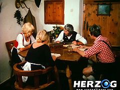 In this classic porno video, a German farmer is having supper with his wife and their neighbours. Once the neighbours leave, he throws his wife on the table and fucks her hard in her incredibly hairy cunt.