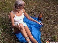 Well, I bet you've never seen such a voracious and werid amateur wanker like this whorish blondie in Seventeen Video sex clip. Spoiled blondie stops the car on the country road. She undresses on the lawn and while being tipsy pale gal with nice boobs uses a bottle neck to please her wet cunt outdoors.