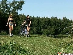 European babe with ponytails is pleasing her coochie chilling in the public park. Horny dude joins her to please her lust. So she greedily sucks his dick deepthroat. Hot outdoor quickie scene presented by Seventeen Video.