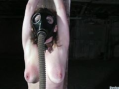 Amazing babe in gas mask gets her vagina drilled
