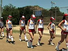 Sexy bitches are wearing sporty costumes looking hell seductive. They are working out on a field while a bunch of studs is watching them from voyeur seats.