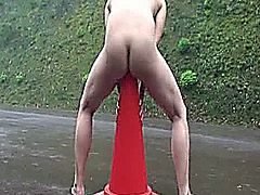 Extreme amateur wife impales herself on a giant road cone in the middle of a public street