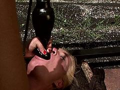Whorish blond hussy lies crucified with hands and legs tied while a steamy brunette domina in fishnet bodystocking drills her snatch with dildo in peppering BDSM sex scene by 21 Sextury.