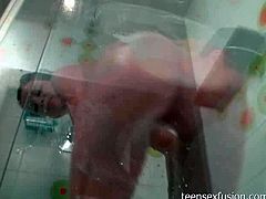 Ashley Stillar is horny in the shower and starts rubbing her pink nipples! Then she spreads her legs and plays with her tiny juicy pussy!