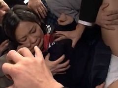 Nana Ogura is a sexy schoolgirl who gets all the men from this bus horny. They take her by surprise and fuck her.