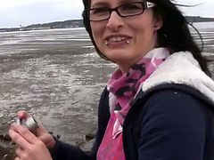 Fugly girl Shelly walks by the sea shore with her beloved BF. She lifts up her top flashing black bra. She also does selfies while chilling on a beach.