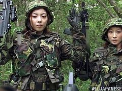 These two sexy Japanese women are in training to become top members in the army. They work out in basic training and then go on a mission. They are captured by two evil generals who tie them up in rope and grab their tits. One woman has her legs spread and she gets fucked hard in her hairy cunt.
