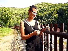 Sexy ass and arousing brunette babe Katia with glasses and a tight black dress enjoys in a city tour and giving head to her guide as a thank you for all the trouble