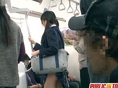 This delicious Japanese schoolgirl heads to the subway station. A guy hits on her there and ends up fucking her in front of other people who pretend not to see them.