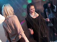 Sinfully lesbian cuties dancing and masturbating their slick beavers in public in a club