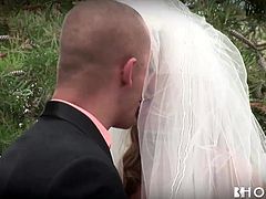 This couple is married out on the lawn of their glorious mansion. The bride gets down on her knees right after the ceremony and starts to suck her husband's cock in front of the guests. He sucks her nipples and then eats her pussy.