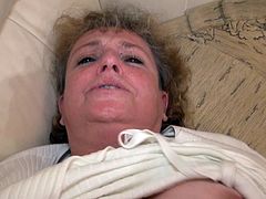 Old, chubby nanny Helene feels horny so she doesn't spares her time and quickly undresses. The whore loves to spend some quality time with herself so she grabs her sex toy and slides it between her pussy lips. After her vagina is ready for penetration Helen slides it the dildo inside and enjoys the feeling