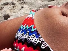 Our guy is trying to convince this black haired sexy babe while she lying on the beach and enjoying the sun. When she is fully convinced the big dick guy is taking her to a quite place where she reveals her big tits and shaved cunt. Then she is stuffing her pretty mouth with my huge man meat.