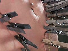 Well Bonnie is having a bad day, she's treated like a piece of cloth, as the executor puts laundry pliers all over her fragile body. With her mouth ball gagged, she can't even scream with pain, while he does his job. Look at her, she deserves a lot more than all that, but will she receive a harsher punishment?