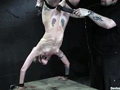 Blonde girl with skinny body gets bounded and gagged. After that she gets her feet whipped and pussy stuffed with big dildo.