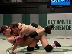 Bella Rossi and Sahara Rain fight fiercely in Ultimate Surrender show. Sahara loses a fight, so she gets punished by Bella. She gets toyed rough right in the ring.