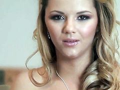 Ashlynn Brooke with massive tits and shaved pussy howls as she dildos her snatch