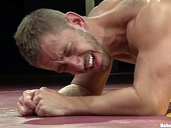 Bryan Cole and Randall O'Reilly are having a struggle on tatami. They fight with each other self-forgetfully and then have ardent doggy style sex.